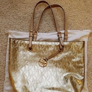 Eye catching gold Michael Kors purse